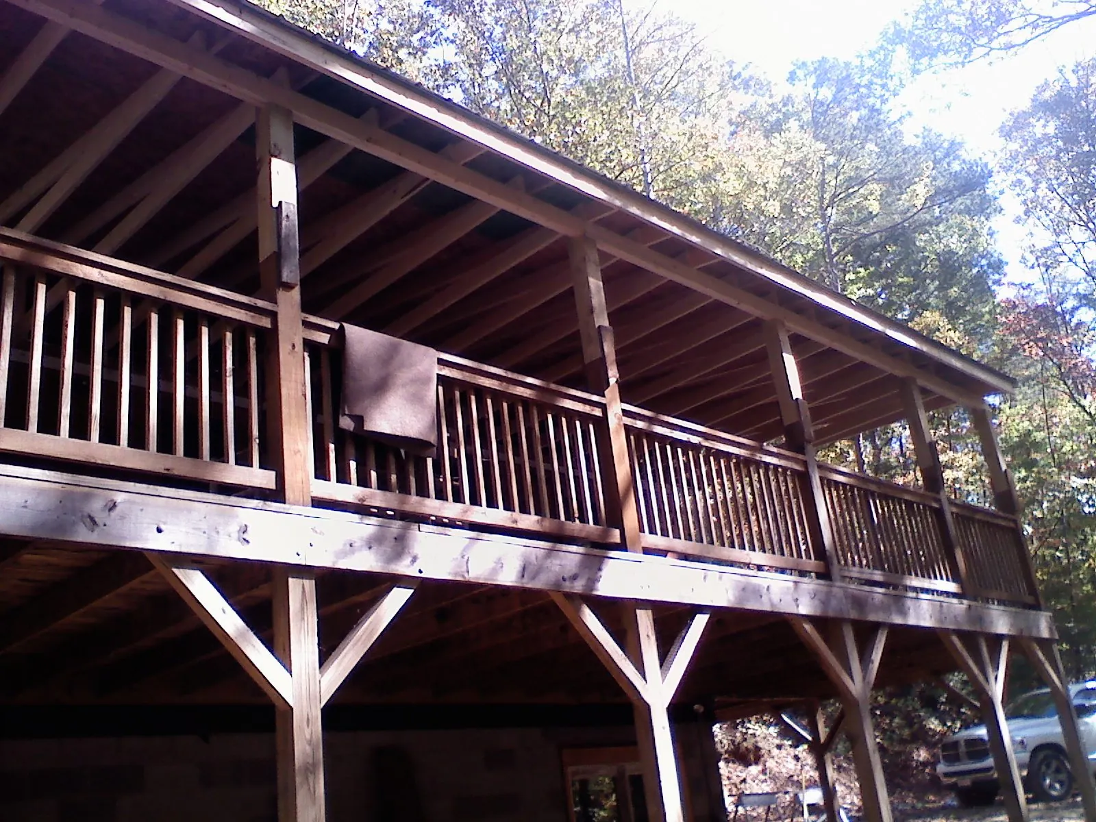 Timber framing under a new elevated porch and deck — Roof Leak Repair in Clear Brook by Roofing Brothers